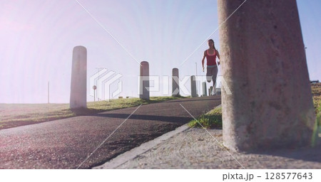 Pink digital waves against african american fit woman running on the street 128577643