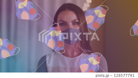 Image of face masks icons over caucasian woman with face mask Image of face masks icons over caucasian woman with face mask 128577791