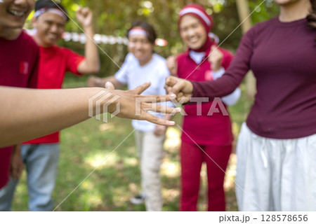 Portrait of an Indonesian southeast asian people celebrate Indonesia Independence Day on the 17th of August. Concept of Kemerdekaan Indonesia 128578656