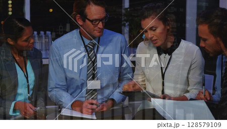 Image of financial data processing over diverse business people 128579109