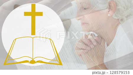 Image of bible icon over senior caucasian woman praying Image of bible icon over senior caucasian woman praying 128579153
