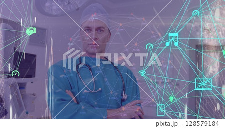 Image of network of connections with icons over serious caucasian male surgeon 128579184