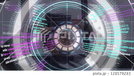 Image of data processing and scope scanning over caucasian man with vr headset 128579283