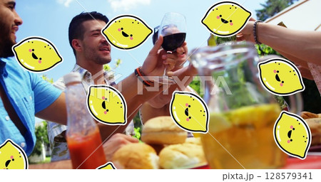 Image of lemon icons over diverse friends at table with drinks Image of lemon icons over diverse friends at table with drinks 128579341