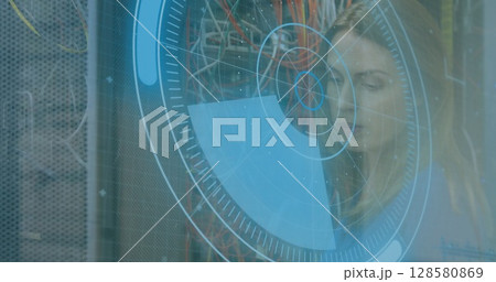 Image of data processing over caucasian woman inspecting server room Image of data processing over caucasian woman inspecting server room 128580869