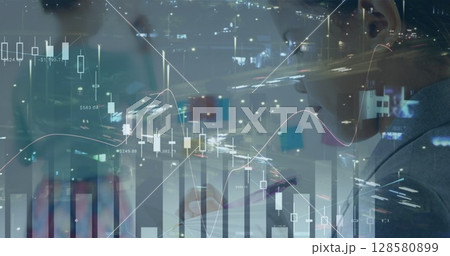 Image of financial data over biracial boy studying and road traffic 128580899