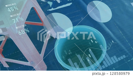 Image of data and graphs over stool and bucket on blue background 128580979