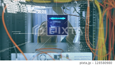 Image of data processing over caucasian female engineer connecting computer wires Image of data processing over caucasian female engineer connecting computer wires 128580980