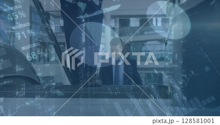 Image of financial data processing over diverse business people in office Image of financial data processing over diverse business people in office 128581001