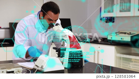 Image of data processing over biracial male scientist 128581064