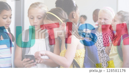 Image of autism text over diverse schoolchildren using smartphone 128581176
