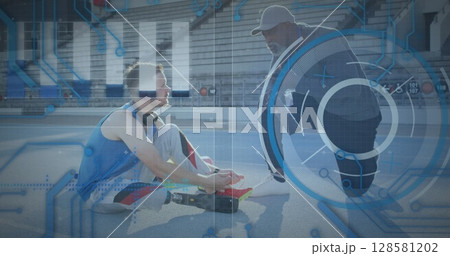 Image of data processing over disabled caucasian sportsman with coach 128581202