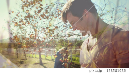 Image of grass over happy caucasian father and son having fun outdoors Image of grass over happy caucasian father and son having fun outdoors 128581986
