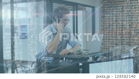 Image of glowing light over caucasian businessman using technology 128582140
