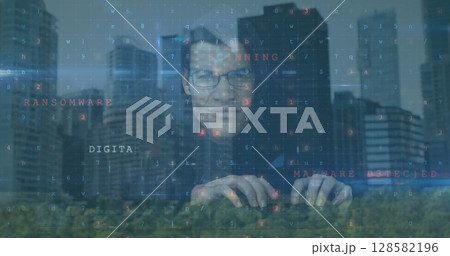 Typing man wearing glasses generating floating code overlays in park, with tree canopy, skyscrapers 128582196
