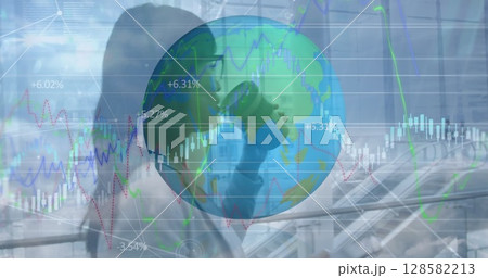 Image of financial data processing over biracial businesswoman Image of financial data processing over biracial businesswoman 128582213