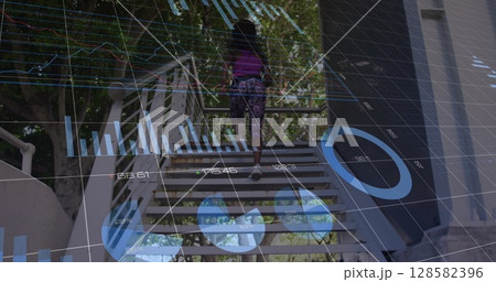 Image of financial graphs and data over african american woman running upstairs Image of financial graphs and data over african american woman running upstairs 128582396