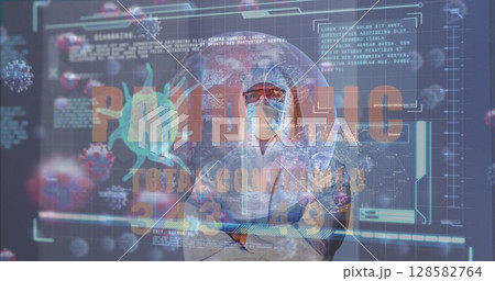 Image of covid 19 cell and data over caucasian male medic in ppe suit 128582764