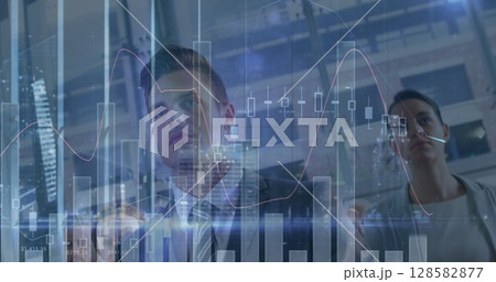 Image of financial data processing over group of diverse business people 128582877