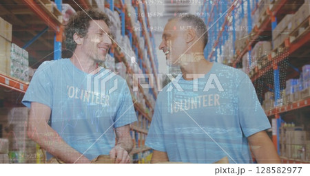 Image of financial data processing over two diverse warehouse worker Image of financial data processing over two diverse warehouse worker 128582977