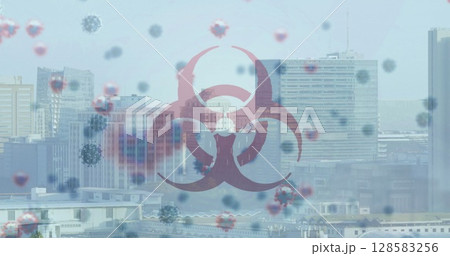 Image of biohazard and virus cells over cityscape 128583256