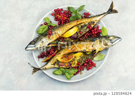 Baked mackerel fish with berries, seafood 128584824