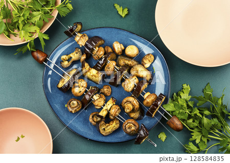 Delicious vegan kebabs, barbecue vegetables. Delicious vegan kebabs, barbecue vegetables. 128584835