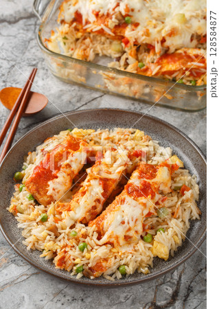 Hong Kong Baked Pork Chop Rice or guk ju pa fan closeup in a plate. Vertical Hong Kong Baked Pork Chop Rice or guk ju pa fan closeup in a plate. Vertical 128584877