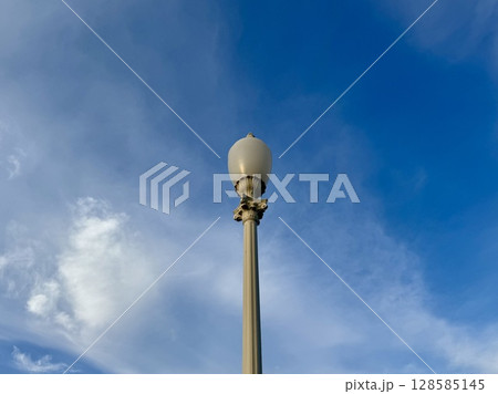 a street lamp on a blue sky background. High quality photo 128585145