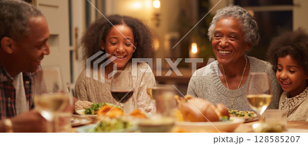 Family dinner happiness together meal smiling love home celebration holiday gathering 128585207