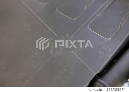 Rat footprint in the car engine 128585974