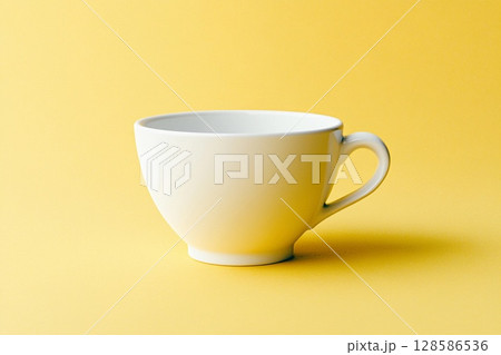 Ceramic Coffee Cup Basking in Bright Yellow Hues on a Sunny Morning. Generative AI 128586536
