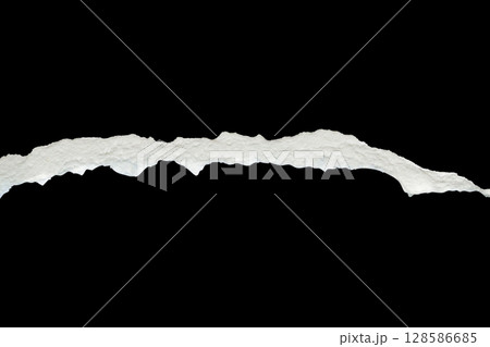 Ripped torn paper edges isolated on black background 128586685