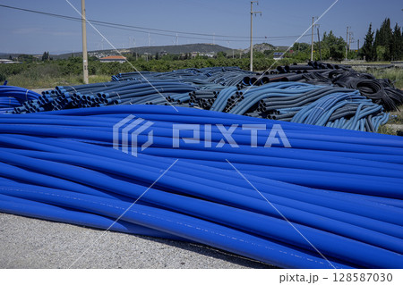Blue PVC pipes, plastic pipes for water supply 128587030