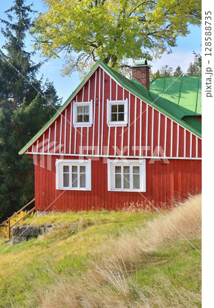 Beautiful wooden cottage in Czech republic 128588735