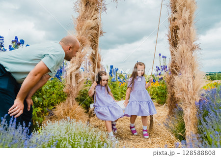 A lavender field, dry grass, warm sun - a wonderful place for a family vacation A lavender field, dry grass, warm sun - a wonderful place for a family vacation 128588808