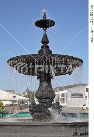 Fountain in Nizhny Novgorod showcasing intricate design in sunny weather Fountain in Nizhny Novgorod showcasing intricate design in sunny weather 128589616