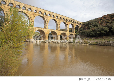 Exploring the grandeur of Pont du Gard aqueduct bridge in France Exploring the grandeur of Pont du Gard aqueduct bridge in France 128589650