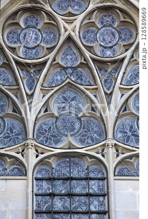 Gothic window in Carcassonne, France, with intricate designs 128589669