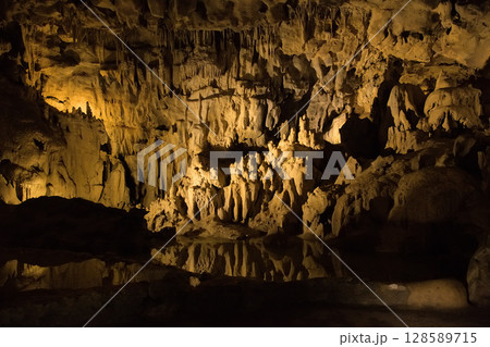 Rock formations of Betharram caves in France during a serene midday excursion 128589715