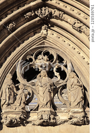 Detail of sculptural reliefs on the facade of Sainte-Secile Cathedral in Albi, France 128589761