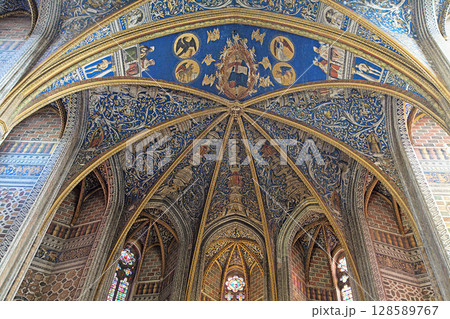 Vibrant blue gothic ceiling of Sainte-Secile cathedral in Albi, France Vibrant blue gothic ceiling of Sainte-Secile cathedral in Albi, France 128589767