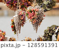 Handmade heart decorations with dried flowers 128591391