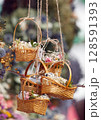 Rustic wicker baskets with dried flower decor 128591393