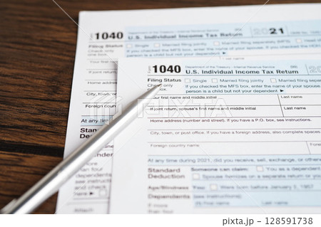 Tax form 1040 U.S. Individual Income Tax Return, business finance. 128591738