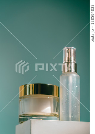 Glass cream jar and facial spray bottle 128594835