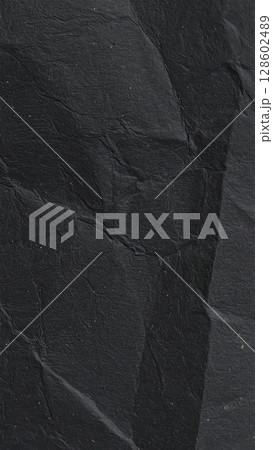 Black rough paper texture, close view paper pattern background 128602489