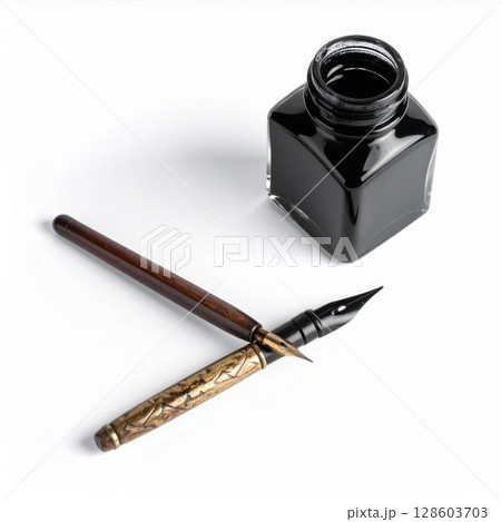 Black Inkwell and Ornate Pen on White Background 128603703