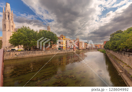 River Onyar and Sant Feliu Church in Girona, Spain 128604992