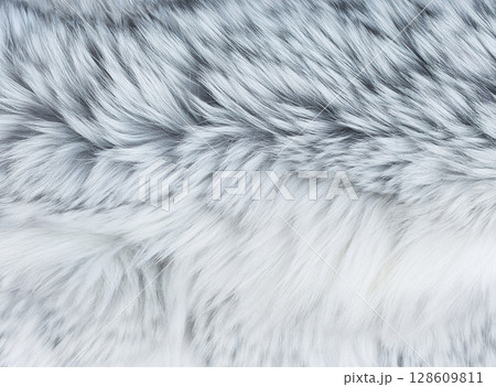 灰色のふわふわフェイクファー 灰色のふわふわフェイクファー 128609811